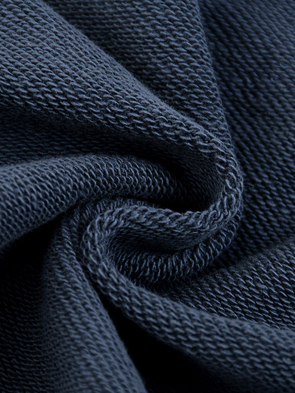 Load image into Gallery viewer, Close-up of dark blue fabric with a textured pattern