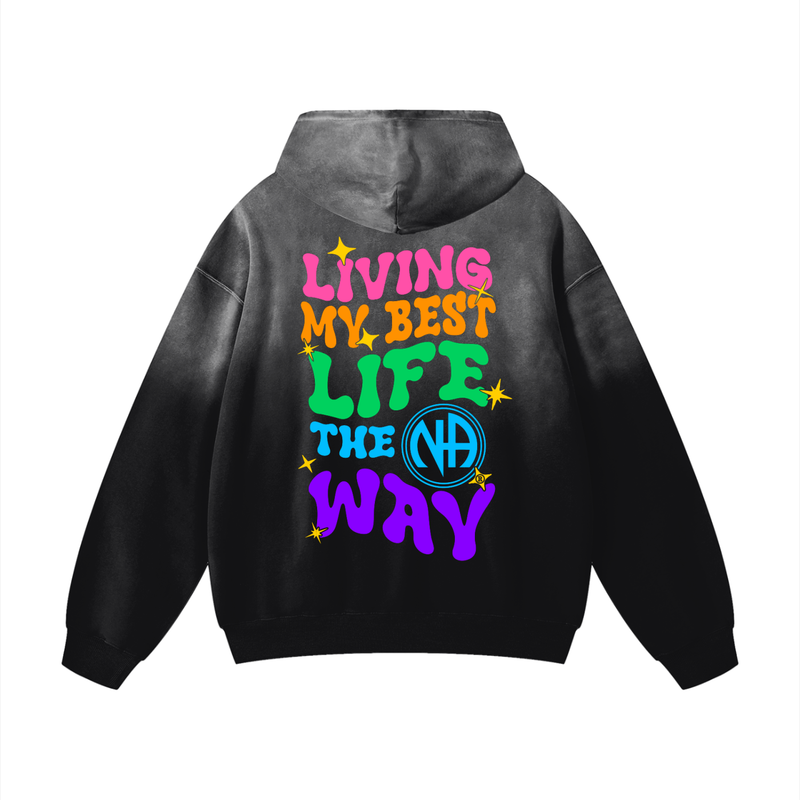Load image into Gallery viewer, Black hoodie with colorful text on the back against a white background