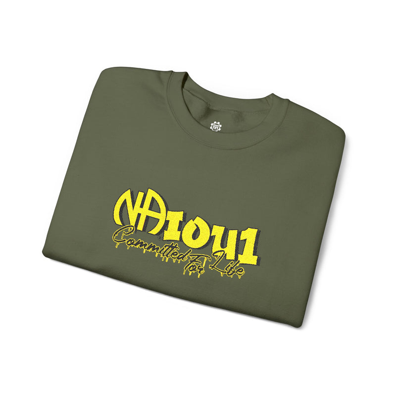 Load image into Gallery viewer, Folded green t-shirt with yellow text