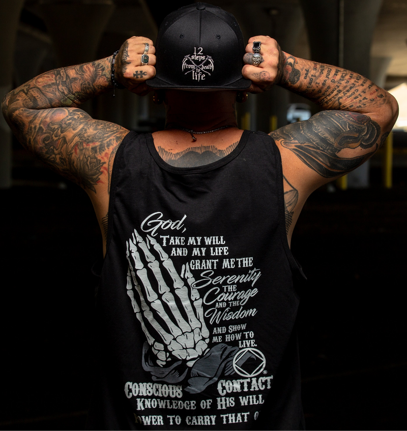 Load image into Gallery viewer, black tank top with a skeleton hand design and text