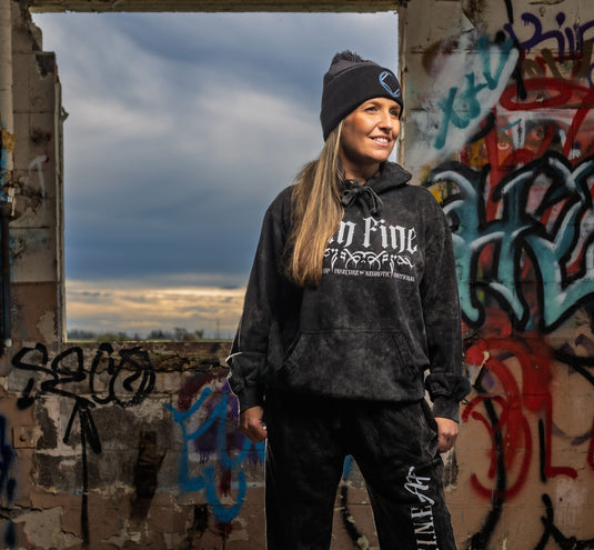 black hoodie, sweatpants, and beanie with Logo and 