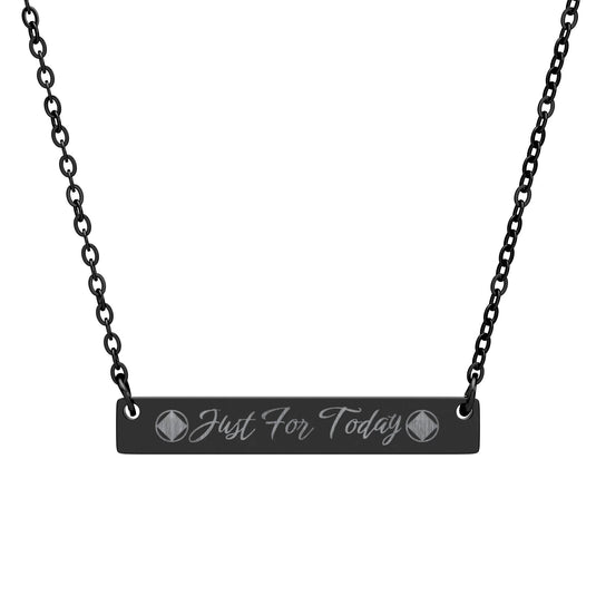 Black necklace with a bar pendant engraved 'Just For Today' on a white background