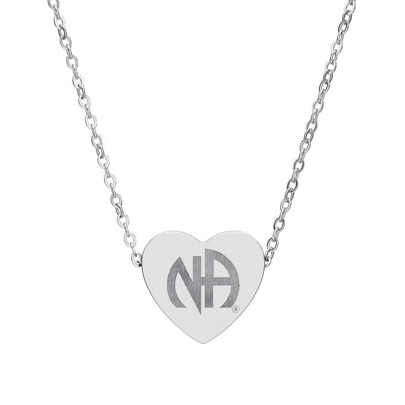 Load image into Gallery viewer, Silver heart-shaped necklace with 'NCA' engraving on a white background
