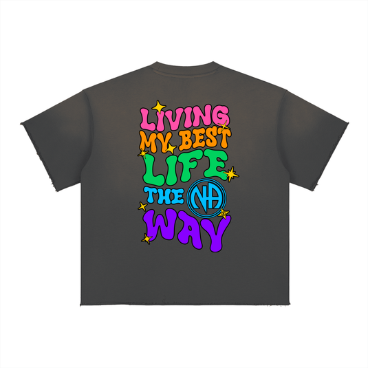 Black t-shirt with colorful text and logo on a white background