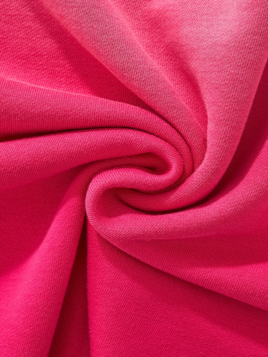 Close-up of pink fabric with folds