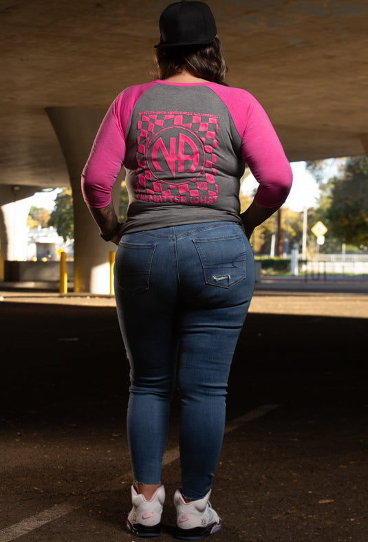 pink and gray shirt with a patterned design and monogram