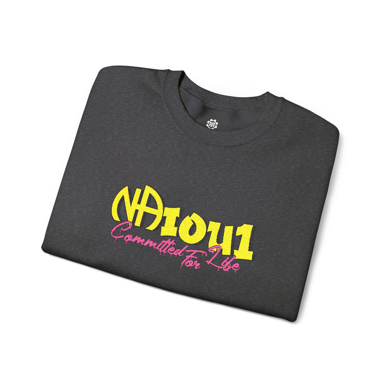 Load image into Gallery viewer, Folded dark gray t-shirt with yellow and pink text
