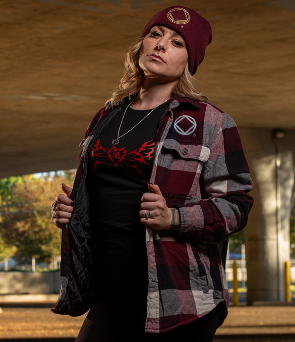 plaid jacket, black shirt with red design