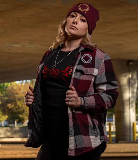 plaid jacket, black shirt with red design