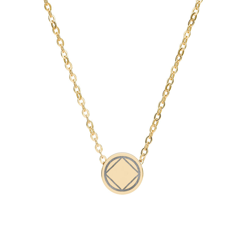 Load image into Gallery viewer, Gold necklace with a geometric pendant on a white background
