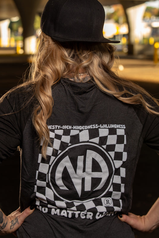 black t-shirt with a logo and text