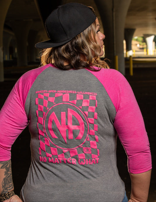 gray and pink long-sleeve shirt with a logo and text