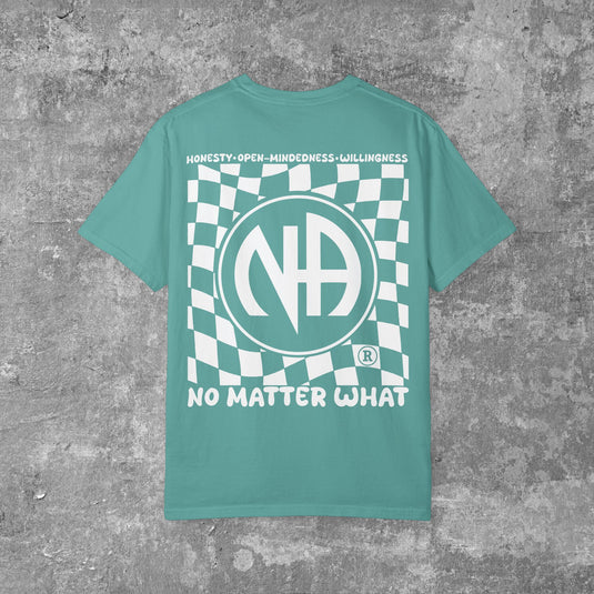 Teal t-shirt with white graphic design on a gray concrete background