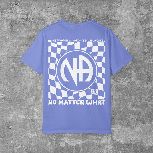 Blue t-shirt with white graphic design on a gray concrete background