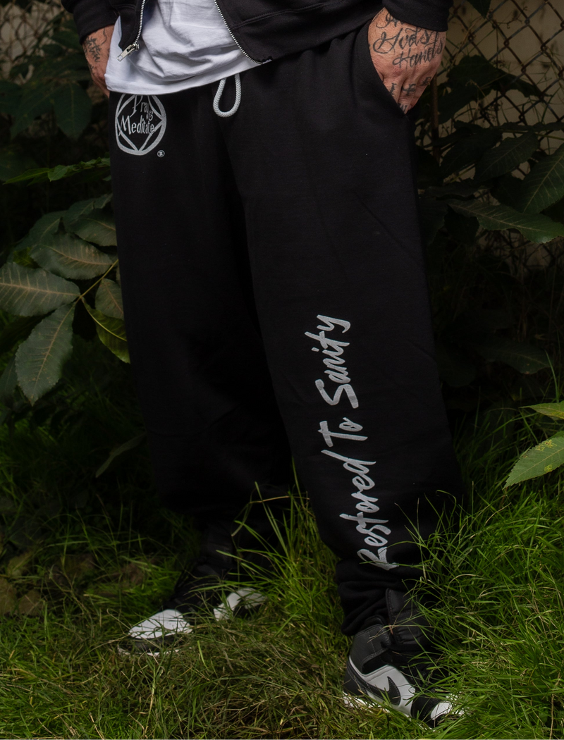 Load image into Gallery viewer, black sweatpants with white text 
