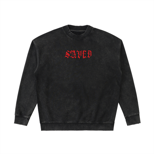 Black sweatshirt with red 'SAVED' text on a white background
