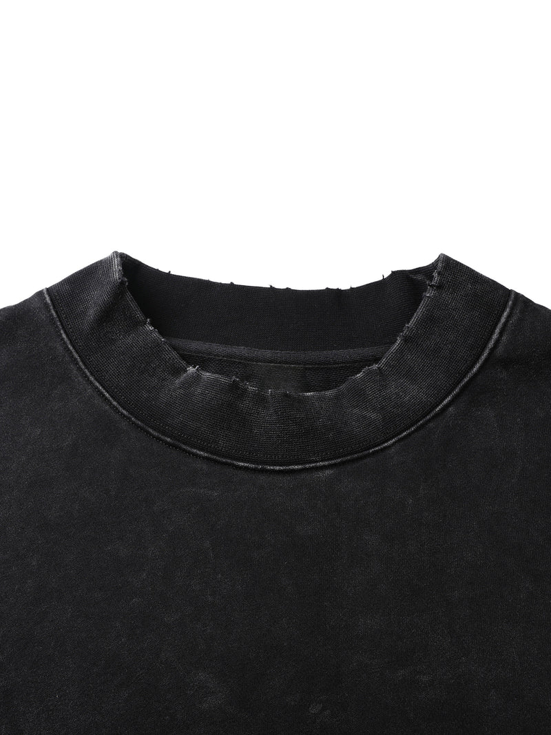 Load image into Gallery viewer, Close-up of a black garment with a textured collar on a white background
