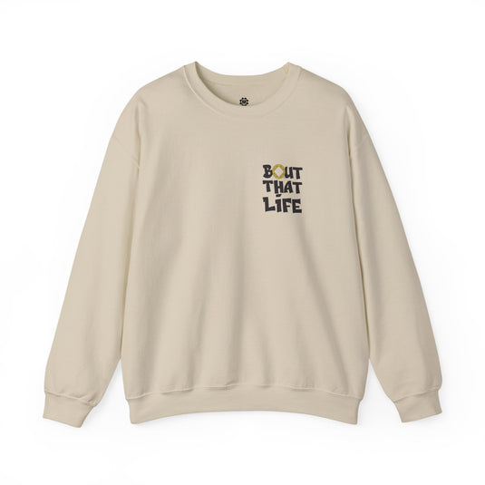Beige sweatshirt with 'BOUT THAT LIFE' text