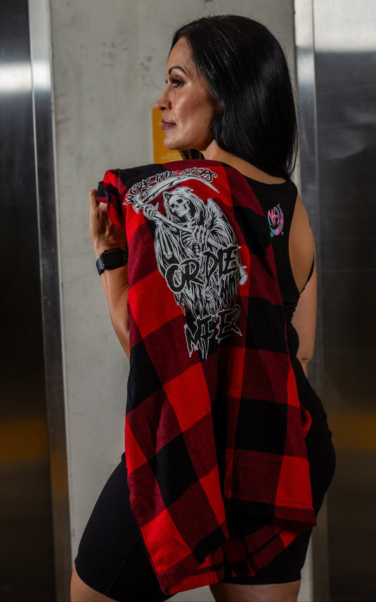 red and black checkered shirt with graphic design