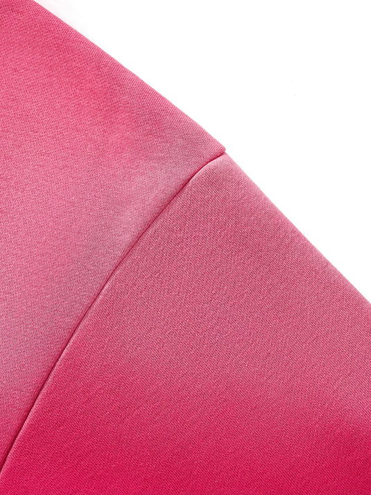 Close-up of a pink fabric texture on a white background