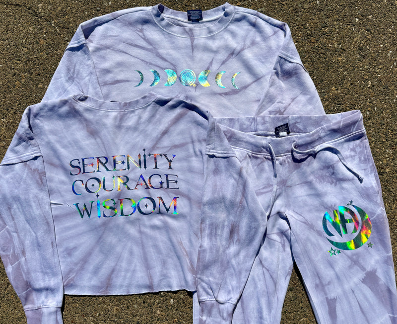 Load image into Gallery viewer, Tie-dye sweatshirt and pants with motivational text and symbols on a textured surface
