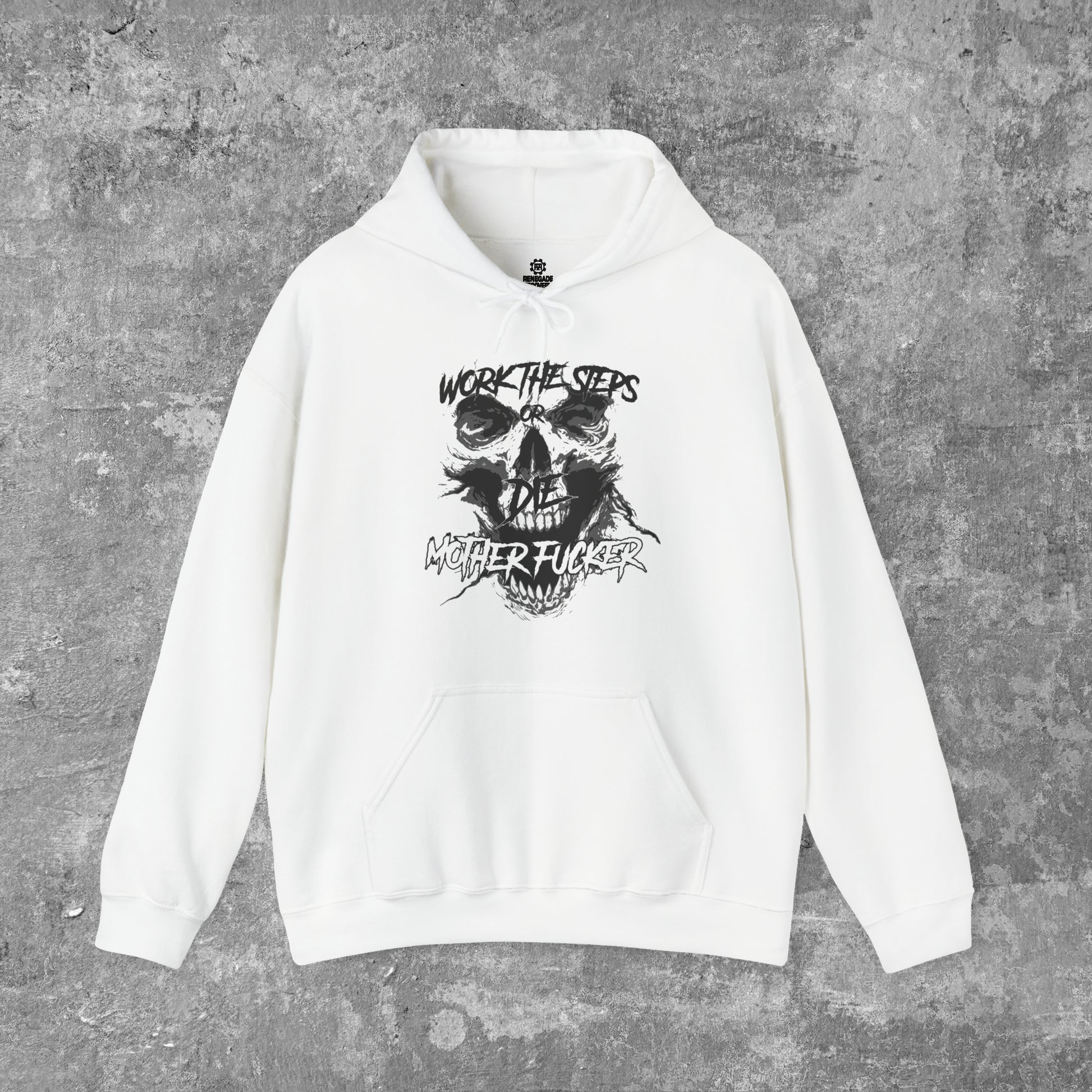 Gray background behind a folded white hooded hoodie/sweatshirt with a black screaming skeleton skull face with text on top that says "WORK THE STEPS OR DIE MOTHERFUCKER" and has a large singular front pocket in the middle.